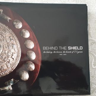 "BEHIND THE SHIELD"